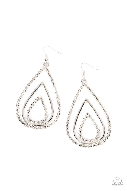 Tastefully Twisty Silver Earring - Paparazzi Accessories  Brushed in a brilliant shimmer, smooth and twisted silver teardrops stack into a rippling glimmery lure. Earring attaches to a standard fishhook fitting.  Featured inside The Preview at GLOW!  Sold as one pair of earrings.