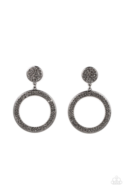 GLOW You Away Black Post Earring - Paparazzi Accessories  Encrusted in rows of smoky hematite rhinestones, a flat gunmetal hoop swings from the bottom of a hematite rhinestone dotted gunmetal frame for a statement-making finish. Earring attaches to a standard post fitting.  Sold as one pair of post earrings.  P5PO-BKXX-207XX