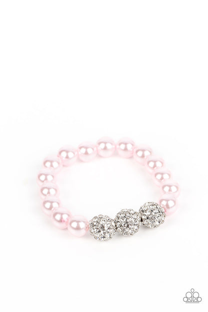 Breathtaking Ball Pink Pearl Bracelet - Paparazzi Accessories  A trio of silver beads encrusted in rhinestones is centered along a strand of classic baby pink pearls. The beads are threaded along a stretchy band, wrapping around the wrist in a refined finish.  Sold as one individual bracelet.  P9RE-PKXX-286XX