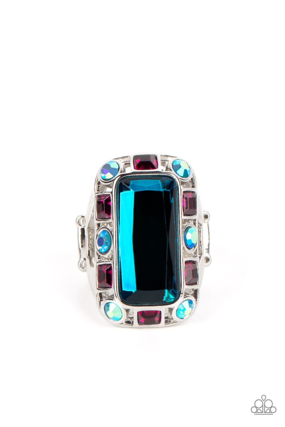 Radiant Rhinestones Blue Ring - Paparazzi Accessories  Pressed into a curved, rectangular silver frame, an oversized emerald-cut blue gem shines atop the finger. Dainty square and round gems in shades of fuchsia and iridescent blue airily encircle the oversized gem for some additional shimmer resulting in a radiant centerpiece. Features a stretchy band for a flexible fit. Due to its prismatic palette, color may vary.  Sold as one individual ring.  ﻿﻿December 2022 Life of the Party!