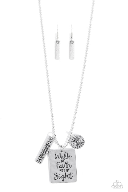 Hanging from a silver ball chain, a hammered collection of a rectangular plate dangles next to a disc featuring a sun, and a bar stamped with the Bible reference "2 Corinthians 5:7". The three dangling silver shapes add eye-catching movement to the inspired design. Prominently stamped on the rectangular pendant, the words "Walk by Faith not by Sight" stand out for a faith-filled finish. Features an adjustable clasp closure.  Sold as one individual necklace. Includes one pair of matching earrings.