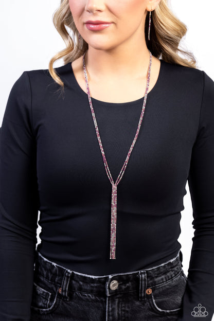 Jazz STRANDS Pink Necklace - Paparazzi Accessories  Featuring sleek square fittings, two strands of glittery, dainty multicolored pink rhinestones connect down the chest for a refined centerpiece. The interconnected rows delicately give way to free-falling multicolored pink layers, creating additional strands of glitzy movement. Features an adjustable clasp closure.  Sold as one individual necklace. Includes one pair of matching earrings.  P2RE-PKXX-399XX