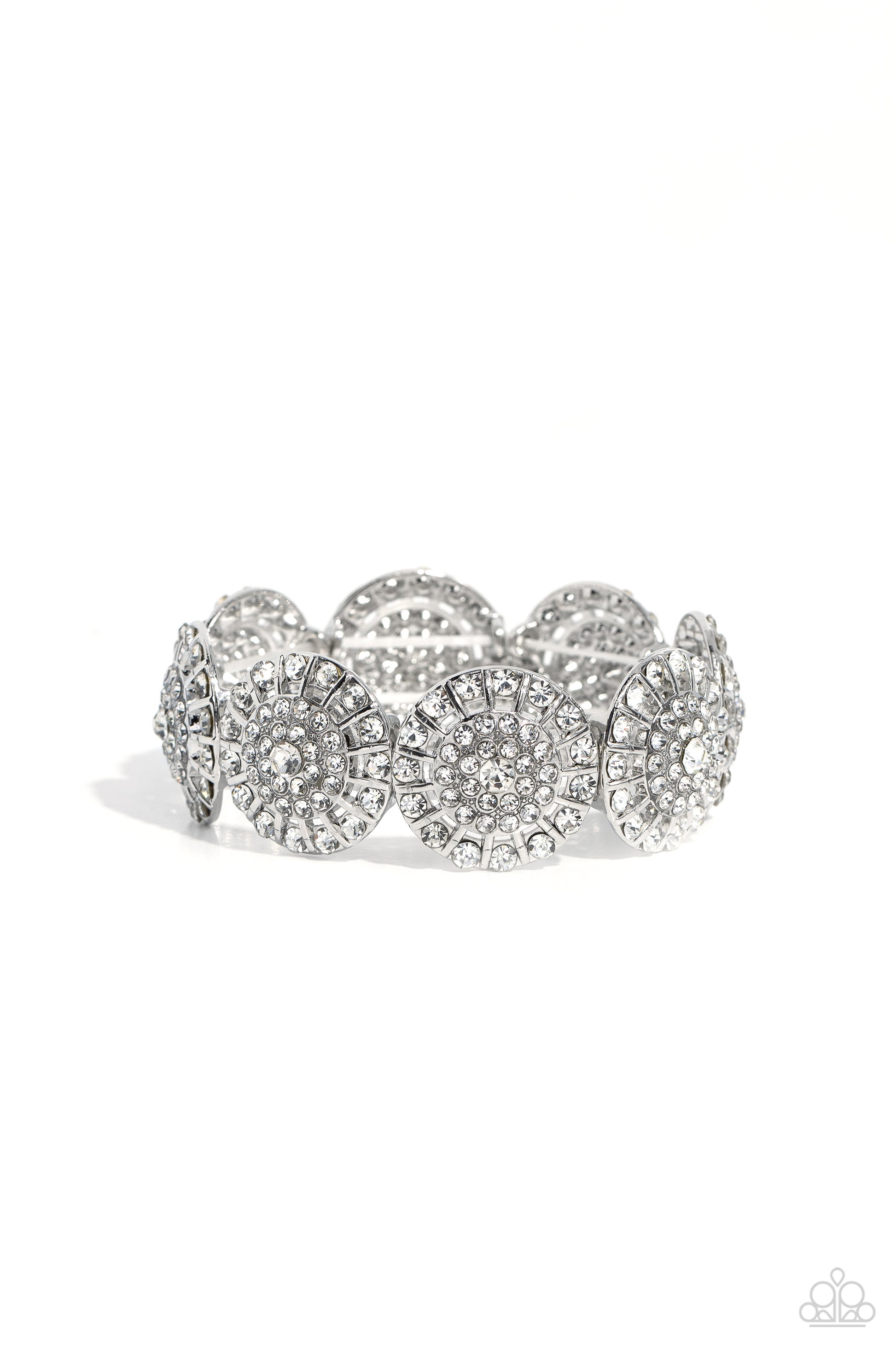 Executive Elegance White Stretch Bracelet - Paparazzi Accessories  Featuring a wheel motif, concaved silver discs embossed in an explosion of white rhinestones slide along a stretchy band around the wrist for a hint of dazzling refinement.  Sold as one individual bracelet.  P9RE-WTXX-576XX