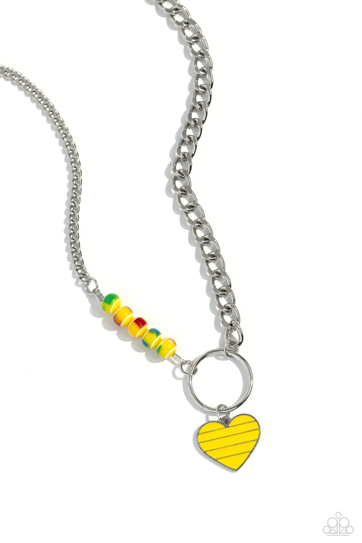 Mismatched Mayhem Yellow Heart Necklace - Paparazzi Accessories  A strand of flat silver curb chain collides with a classic chain and a vivacious collection of yellow beads, featuring various multicolored splatters across its surface, to create an abstract blend of color and class. The mismatched chains connect to a large silver hoop with a yellow-striped silver heart dangling at the bottom of the display, infusing the design with additional charm. Features an adjustable clasp closure.