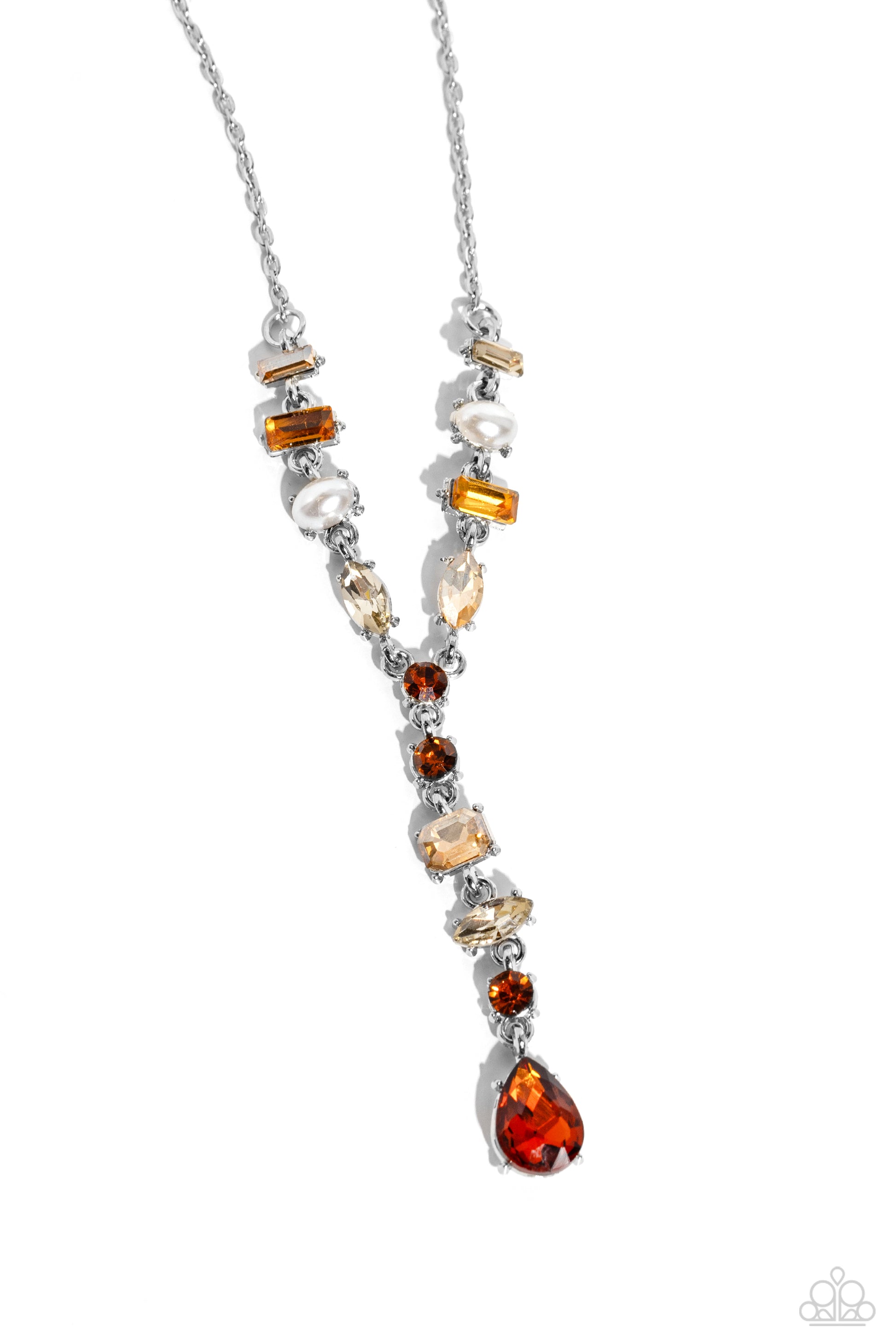 Dreamy Dowry Brown Rhinestone Necklace - Paparazzi Accessories  Featuring pronged silver fittings, mismatched polished white pearls and various glassy topaz, light colored topaz, and champagne gems dance along a shimmery dainty silver chain. Matching gems trickle along a single silver chain with an exaggerated topaz gem teardrop at the bottom of the design, creating an extended pendant below the collar. Features an adjustable clasp closure.