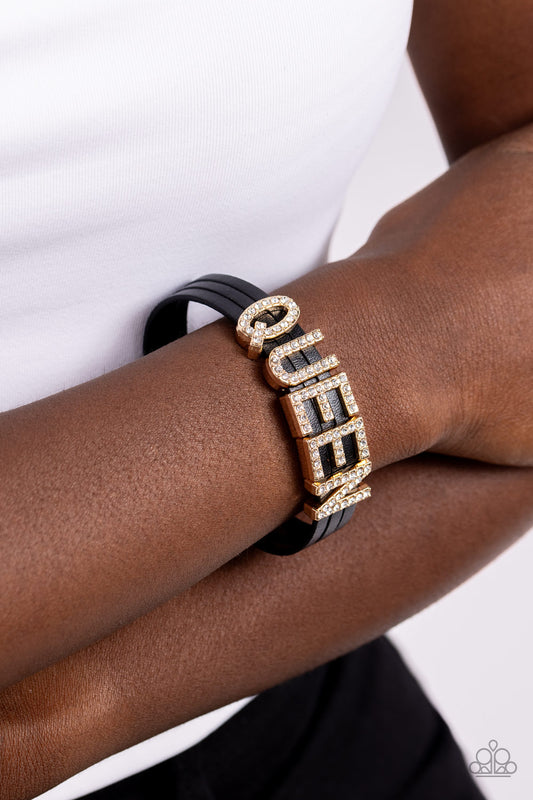 Queen of My Life Gold Magnetic Bracelet - Paparazzi Accessories  Featuring glistening white rhinestones, gold letter frames forming the word "QUEEN" are threaded along layers of black leather strands around the wrist for a dazzling statement. Features a magnetic closure.  Sold as one individual bracelet.  SKU: P9SE-GDXX-064XX