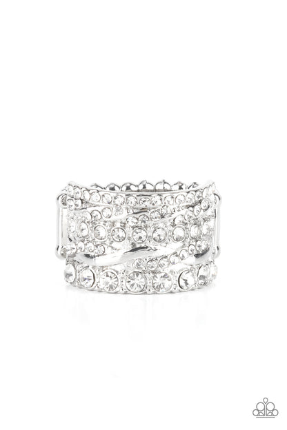 Exclusive Elegance - White Item #P4RE-WTXX-427XX Row after row of radiantly mismatched white rhinestones and glistening silver bands haphazardly stack across the finger, coalescing into a dramatic display of dazzle. Features a stretchy band for a flexible fit.  Sold as one individual ring.